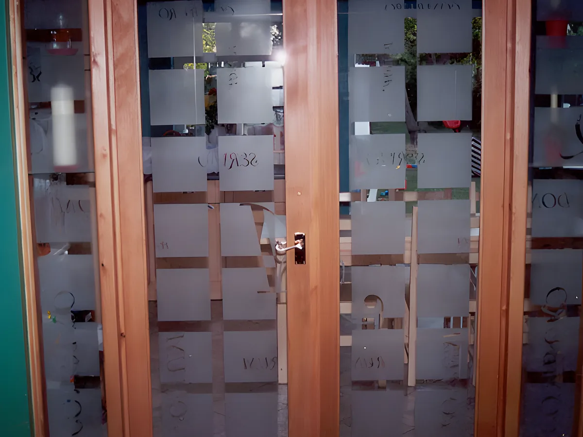 Wood double doors with tall glass inserts