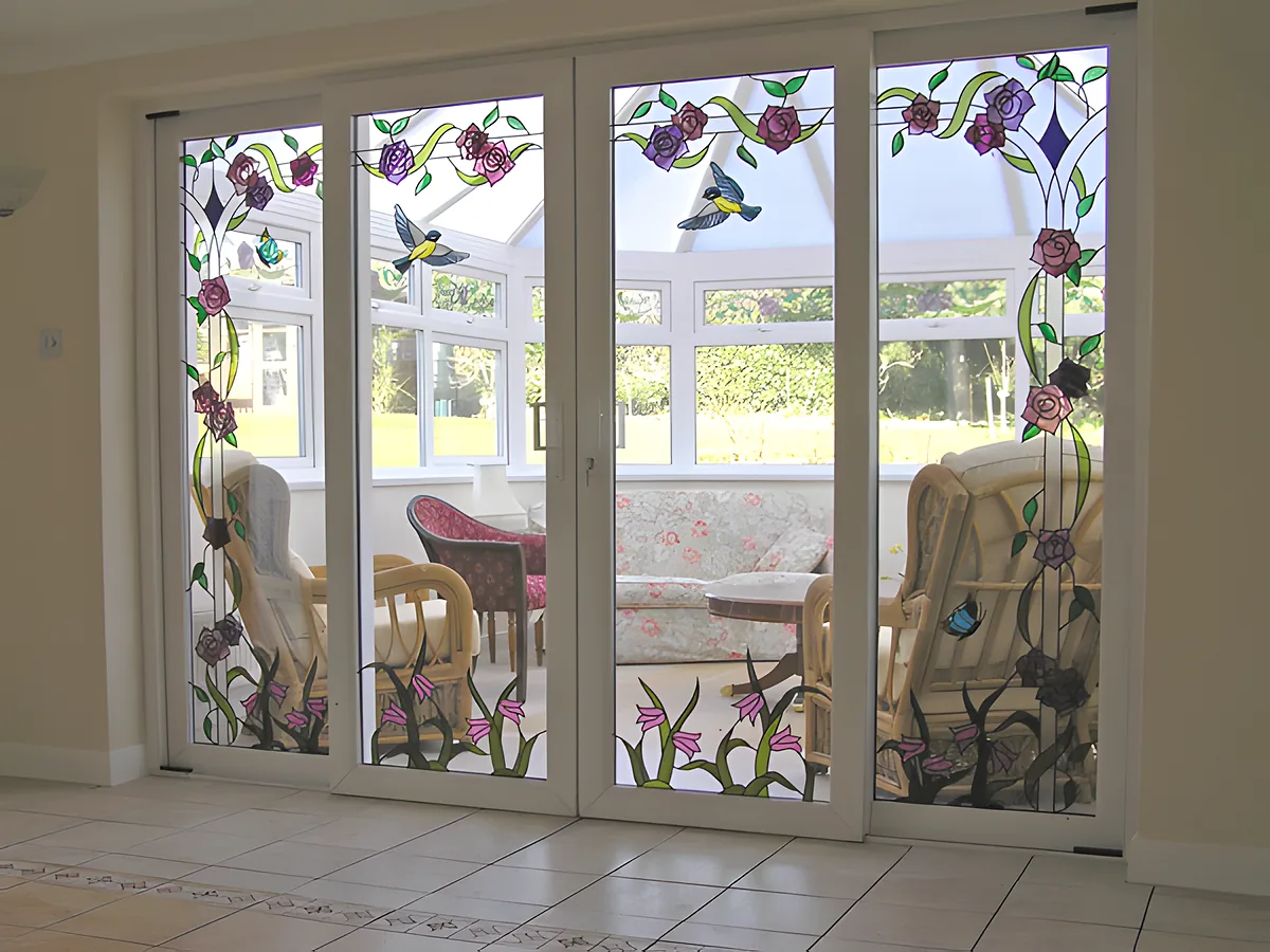 Patio doors with decorative etched glass panels